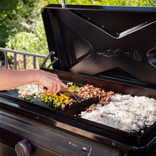 Traeger Flatrock flat top grill in use cooking food