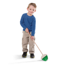 boy sweeping