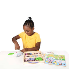 girls playing with magnetic dress up set