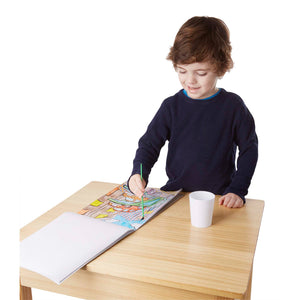 boy painting with water