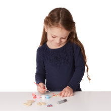 heart magnet decorating set in use