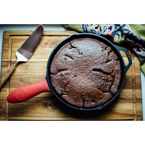 Lodge Cast Iron Red Silicone Hot Handle Holder in use