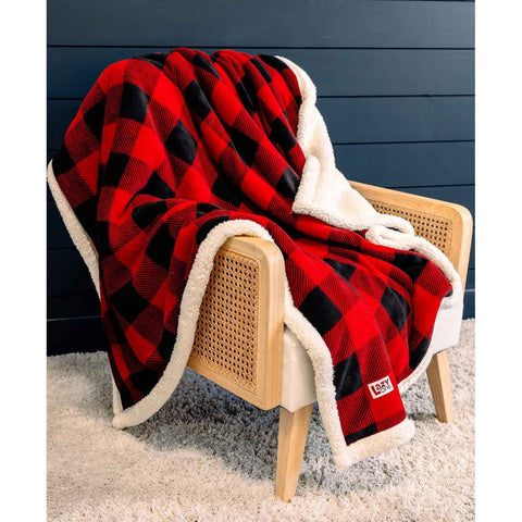 Lazy One red buffalo plaid sherpa throw blanket on chair