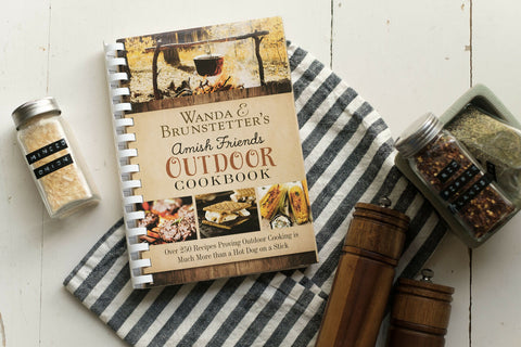 Wanda Brunstetter's Amish Friends Outdoor Cookbook on table