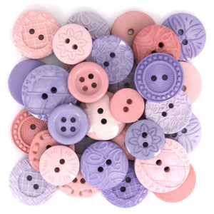 Assortment of pink and lavender buttons