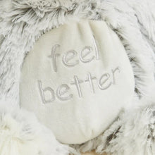 up close of embroidered feel better sentiment