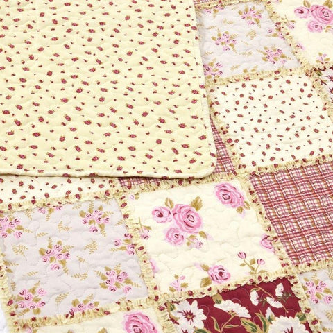 Closeup of patterns of Virah Bella Kensington Floral Quilt Set
