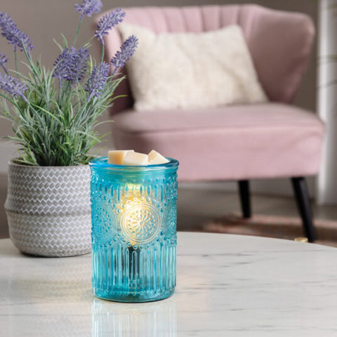 Candle Warmers Parisian Glass Vintage Bulb Illumination Fragrance Warmer in living room
