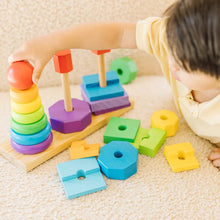 Boy playing with Geometric Stacker Toddler Toy 567 