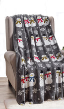 Gray snowman throw blanket covering armchair