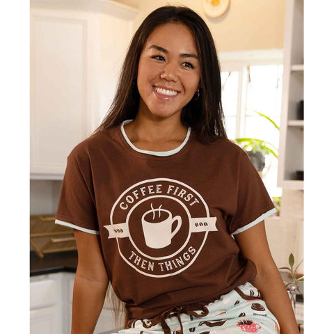 Woman wearing Lazy One Coffee First women's pajama tee shirt