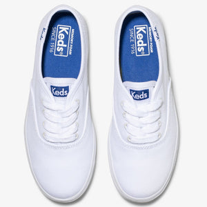 Pair of Keds girls' Champion CVO white canvas shoes