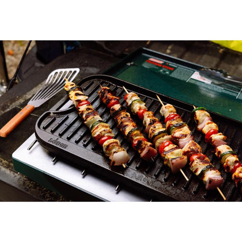 Grilling skewers on Lodge Cast Iron Pro-Grid Reversible Griddle/Grill