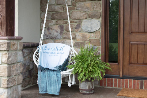Boats on a Lake Fleece Throw on a Porch Swing