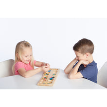 Children playing mancala