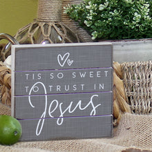 Sign Displayed on a Tabletop