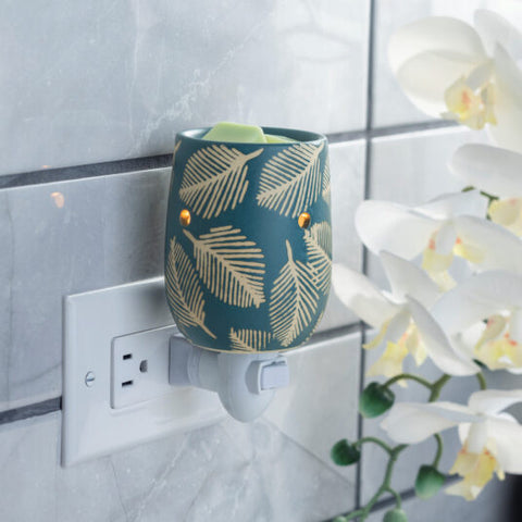 Fragrance Warmer Plugged Into Outlet