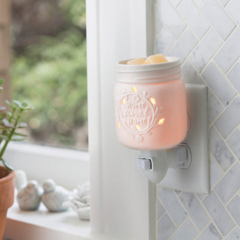 Plug-in candle warmer.