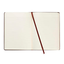 Open journal with lined pages.