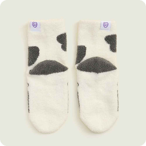 Warmies Cow Children's Plush Crew Socks showing soles