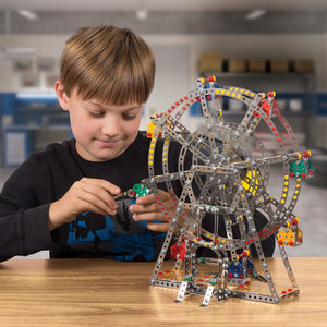 Boy Putting Together Steel Works Ferris Wheel