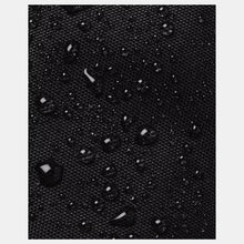 Black material repelling water droplets