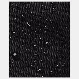 Black material repelling water droplets