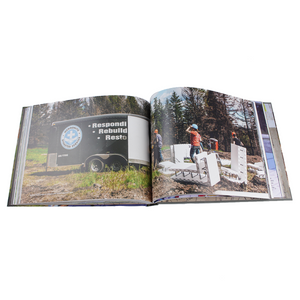 Many Hands book open showing picture