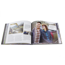 Many Hands book open showing testimony