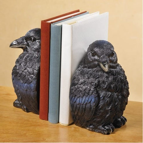 Crow Bookends Holding Up Books