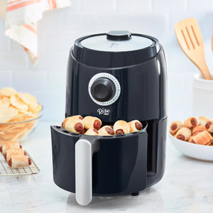 Black Compact Air Fryer RCAF160GBBK02 frying doggies in a blanket 