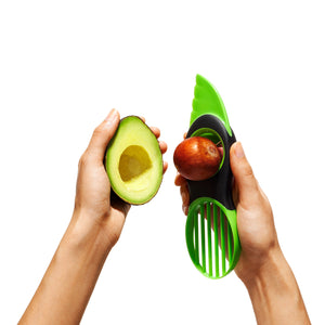 Avocado slicer in use