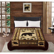 Bear blanket on bed