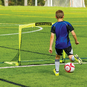 child playing soccer