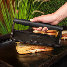 Blackstone Medium Cast Iron Griddle Press on sandwich