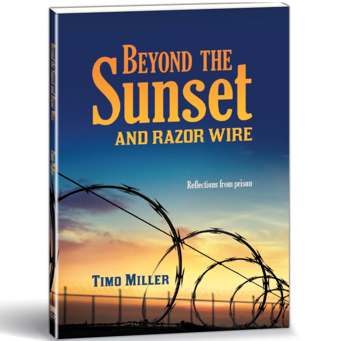 Sunset and razor wires by Timo Miller