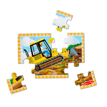 Melissa & Doug wooden bulldozer puzzle being put together