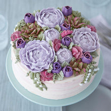 Cake with purple roses