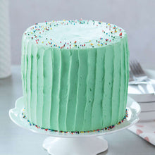 Frosted cake with sprinkles