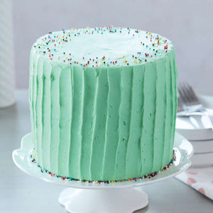 Frosted cake with sprinkles
