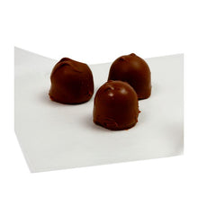 Chocolates on wax paper