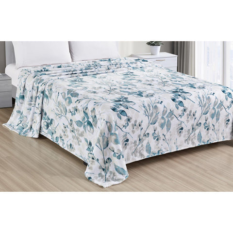 Dempsey floral printed blanket on bed