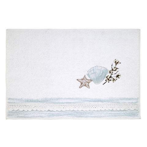 Bath mat with seashells