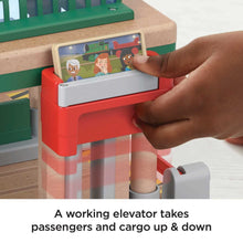 A Working Elevator Takes Passengers and Cargo Up & Down