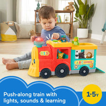 Push-along train with lights, sounds, and learning