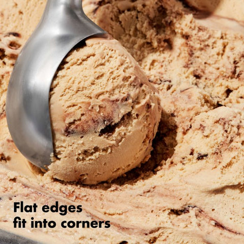 Scooping out ice cream close-up