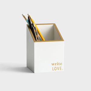 White with gold trim and lettering "Write Love" pencil holder with sample pens and pencils