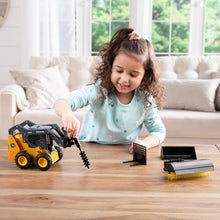 girl playing with skid loader