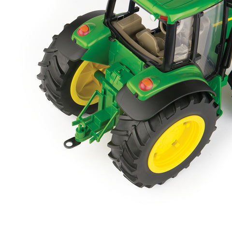 Trailer hitch on the back of toy tractor