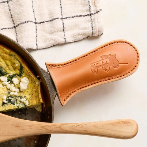 Lancaster Cast Iron leather handle cover on skillet